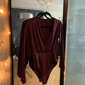 Long sleeved body suit